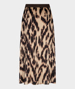 A pleated midi skirt with an abstract leopard print pattern in beige, brown, and black, featuring a solid dark brown waistband, shown against a light gray background.